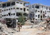 Боевики из блокированных сирийской армией районов Алеппо начали сдавать оружие